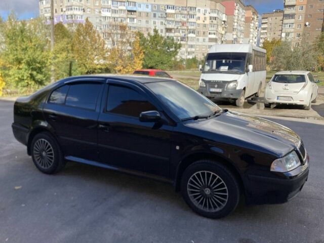 Чорний Шкода Октавія, об'ємом двигуна 1.6 л та пробігом 268 тис. км за 7200 $, фото 9 на Automoto.ua