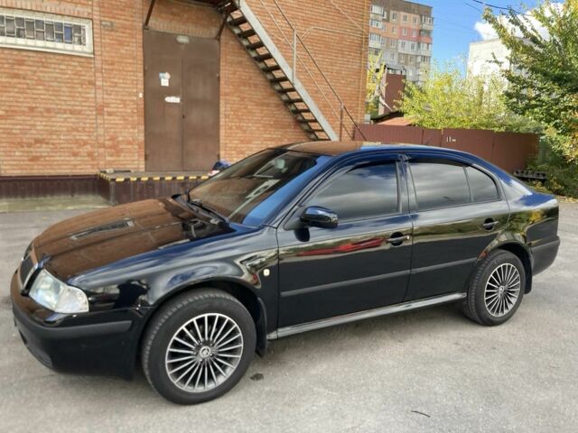 Чорний Шкода Октавія, об'ємом двигуна 1.6 л та пробігом 268 тис. км за 7200 $, фото 1 на Automoto.ua