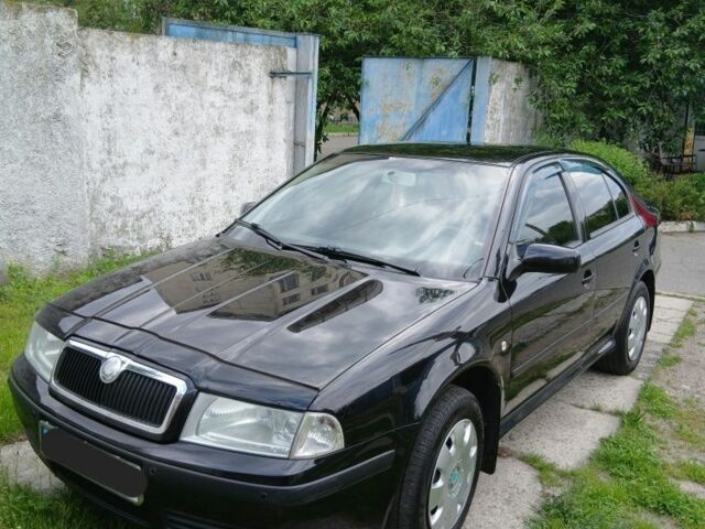 Черный Шкода Октавия, объемом двигателя 1.6 л и пробегом 230 тыс. км за 5500 $, фото 2 на Automoto.ua