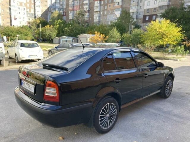 Чорний Шкода Октавія, об'ємом двигуна 1.6 л та пробігом 268 тис. км за 7200 $, фото 6 на Automoto.ua