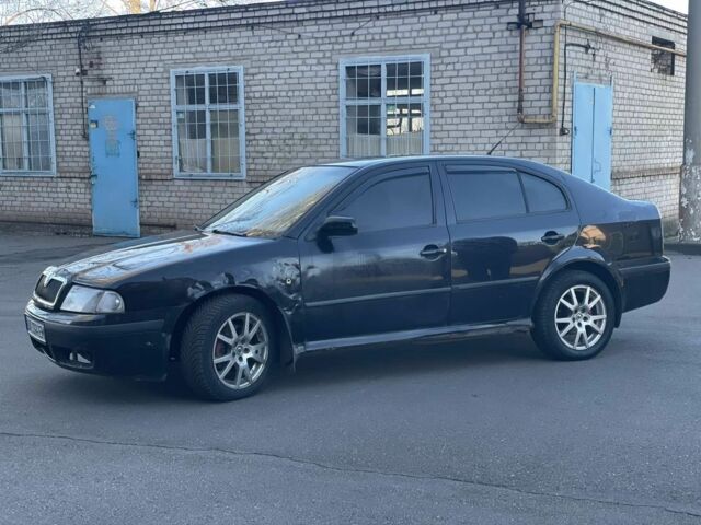 Черный Шкода Октавия, объемом двигателя 1.8 л и пробегом 275 тыс. км за 2250 $, фото 12 на Automoto.ua