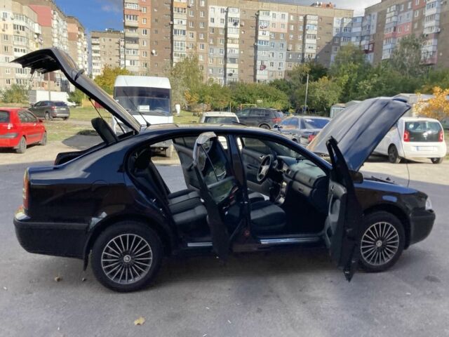 Чорний Шкода Октавія, об'ємом двигуна 1.6 л та пробігом 268 тис. км за 7200 $, фото 21 на Automoto.ua
