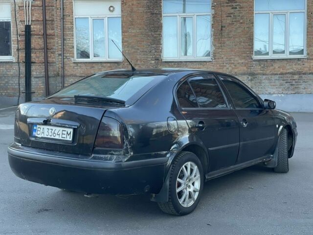 Черный Шкода Октавия, объемом двигателя 1.8 л и пробегом 275 тыс. км за 2250 $, фото 9 на Automoto.ua