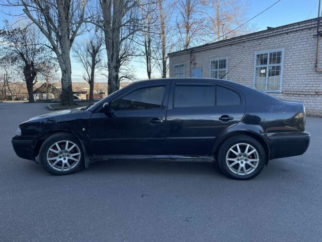 Черный Шкода Октавия, объемом двигателя 1.8 л и пробегом 275 тыс. км за 2250 $, фото 13 на Automoto.ua