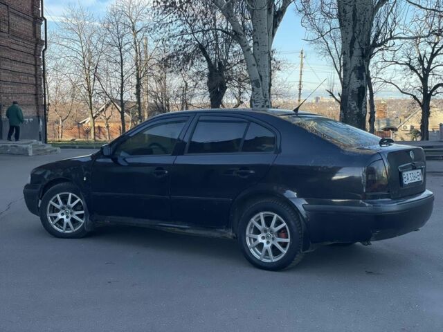 Черный Шкода Октавия, объемом двигателя 1.8 л и пробегом 275 тыс. км за 2250 $, фото 14 на Automoto.ua