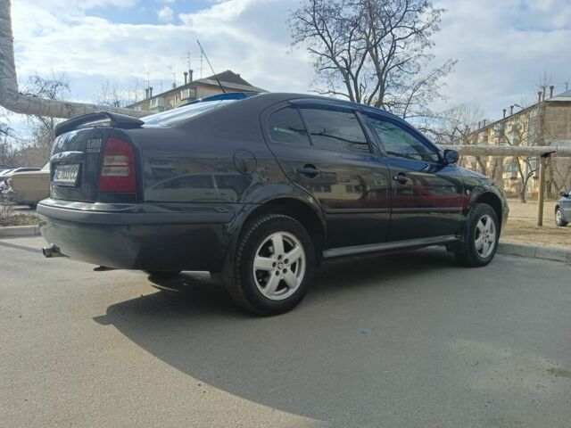 Чорний Шкода Октавія, об'ємом двигуна 2 л та пробігом 235 тис. км за 5000 $, фото 5 на Automoto.ua