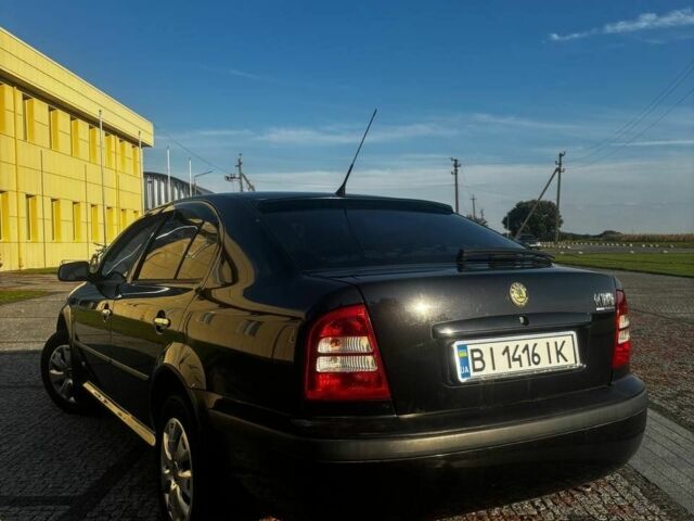 Черный Шкода Октавия, объемом двигателя 1.6 л и пробегом 218 тыс. км за 5900 $, фото 1 на Automoto.ua