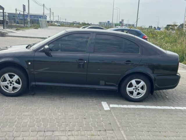 Черный Шкода Октавия, объемом двигателя 1.6 л и пробегом 242 тыс. км за 4000 $, фото 4 на Automoto.ua