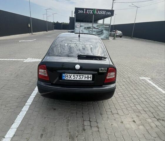 Черный Шкода Октавия, объемом двигателя 1.6 л и пробегом 242 тыс. км за 4000 $, фото 1 на Automoto.ua