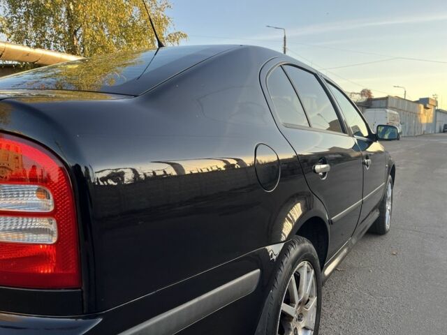 Черный Шкода Октавия, объемом двигателя 1.8 л и пробегом 276 тыс. км за 5500 $, фото 7 на Automoto.ua