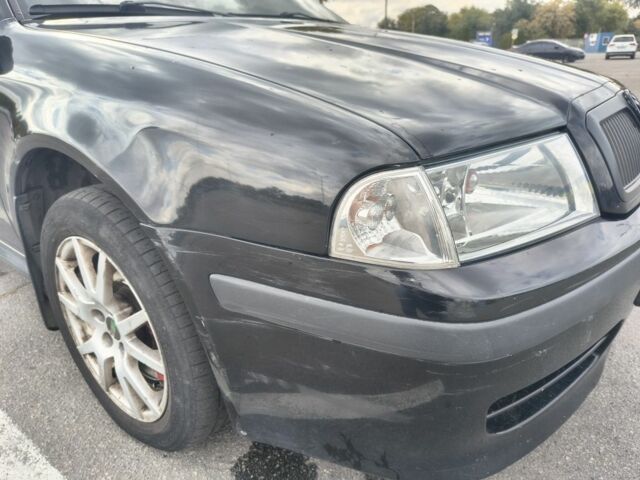 Чорний Шкода Октавія, об'ємом двигуна 1.8 л та пробігом 245 тис. км за 5700 $, фото 10 на Automoto.ua