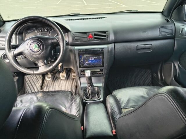 Чорний Шкода Октавія, об'ємом двигуна 1.8 л та пробігом 245 тис. км за 5700 $, фото 7 на Automoto.ua