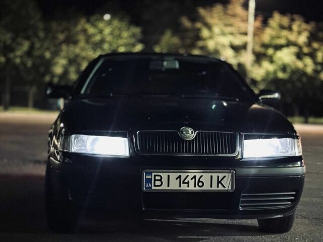 Черный Шкода Октавия, объемом двигателя 1.6 л и пробегом 218 тыс. км за 5900 $, фото 4 на Automoto.ua
