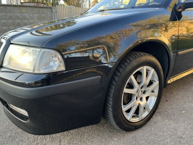 Черный Шкода Октавия, объемом двигателя 1.8 л и пробегом 276 тыс. км за 5500 $, фото 1 на Automoto.ua