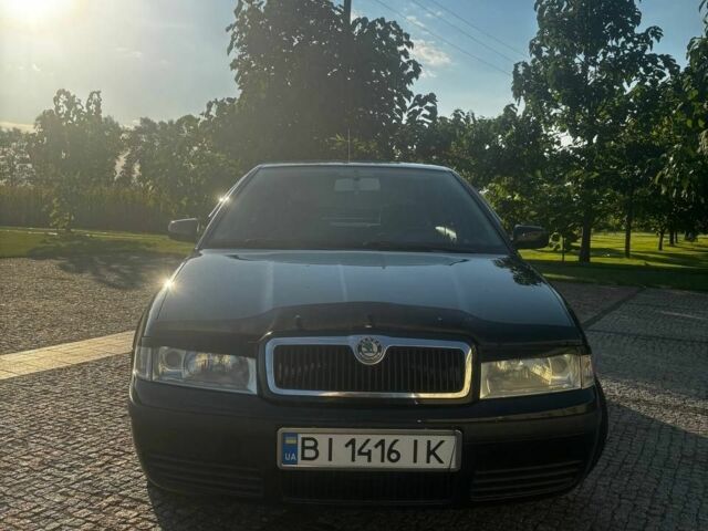 Черный Шкода Октавия, объемом двигателя 1.6 л и пробегом 218 тыс. км за 5900 $, фото 3 на Automoto.ua