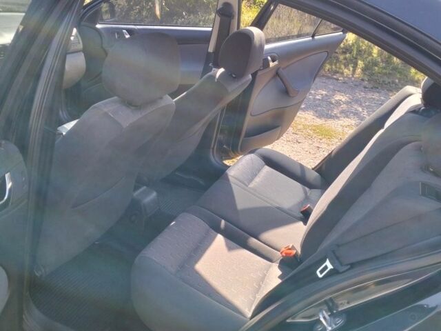 Черный Шкода Октавия, объемом двигателя 1.6 л и пробегом 218 тыс. км за 5900 $, фото 10 на Automoto.ua