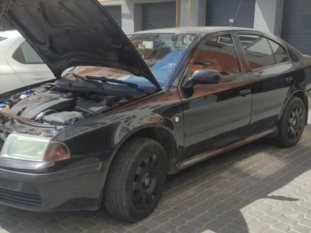 Черный Шкода Октавия, объемом двигателя 1.6 л и пробегом 279 тыс. км за 4900 $, фото 3 на Automoto.ua