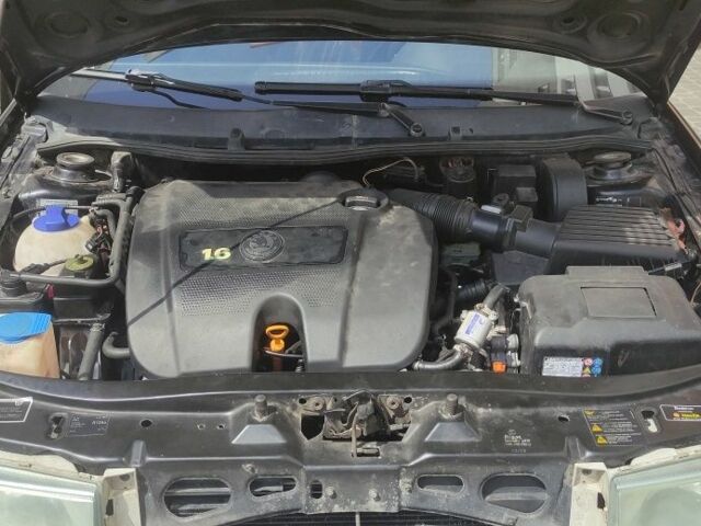 Черный Шкода Октавия, объемом двигателя 1.6 л и пробегом 279 тыс. км за 4900 $, фото 4 на Automoto.ua