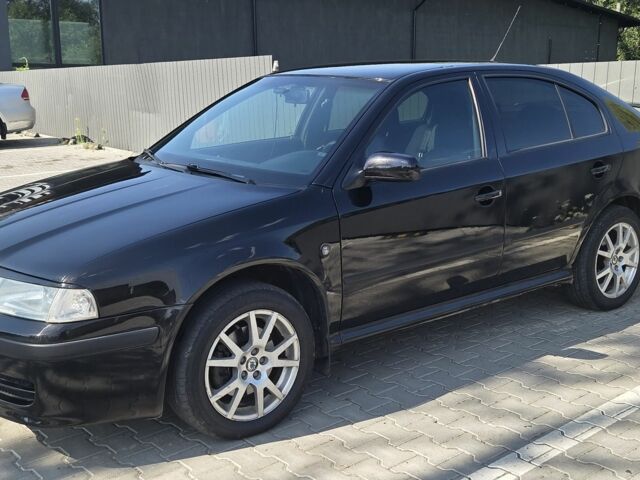 Черный Шкода Октавия, объемом двигателя 1.8 л и пробегом 225 тыс. км за 6000 $, фото 2 на Automoto.ua