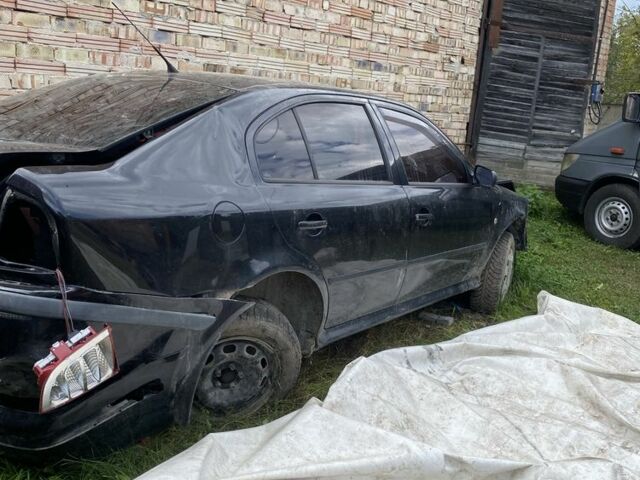 Черный Шкода Октавия, объемом двигателя 9 л и пробегом 215 тыс. км за 1599 $, фото 3 на Automoto.ua