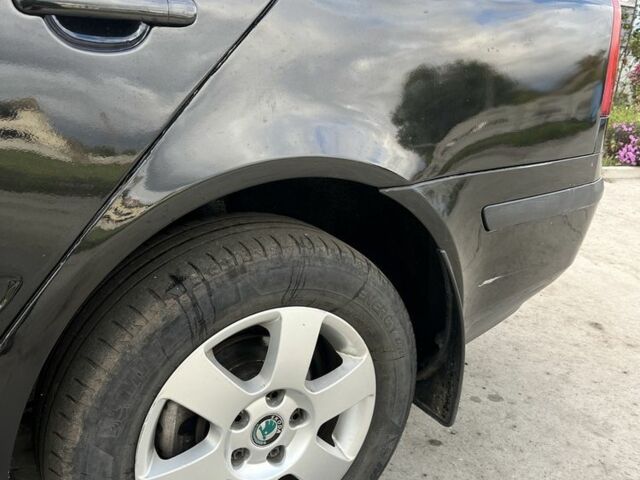 Черный Шкода Октавия, объемом двигателя 2 л и пробегом 330 тыс. км за 4250 $, фото 8 на Automoto.ua