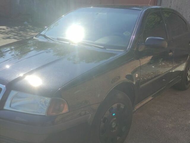 Черный Шкода Октавия, объемом двигателя 1.6 л и пробегом 279 тыс. км за 4900 $, фото 2 на Automoto.ua