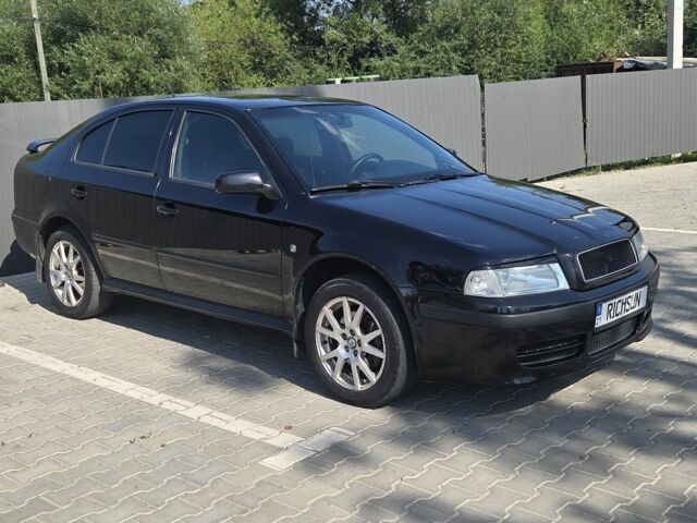 Черный Шкода Октавия, объемом двигателя 1.8 л и пробегом 225 тыс. км за 6000 $, фото 1 на Automoto.ua
