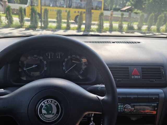 Черный Шкода Октавия, объемом двигателя 1.8 л и пробегом 225 тыс. км за 6000 $, фото 5 на Automoto.ua