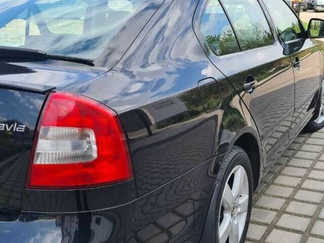 Черный Шкода Октавия, объемом двигателя 2 л и пробегом 228 тыс. км за 7000 $, фото 2 на Automoto.ua