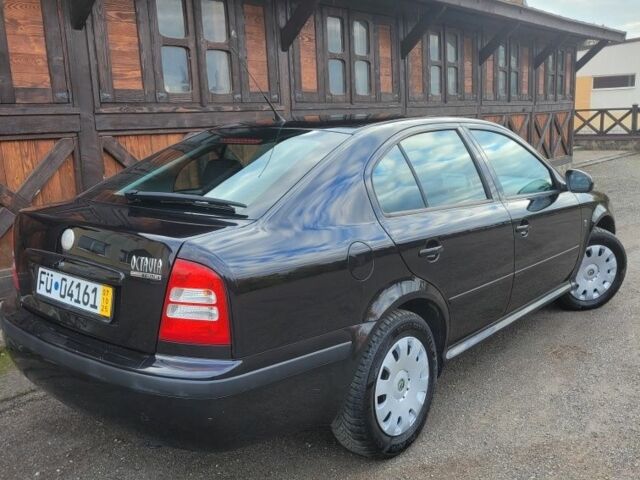 Черный Шкода Октавия, объемом двигателя 1.6 л и пробегом 197 тыс. км за 7150 $, фото 5 на Automoto.ua