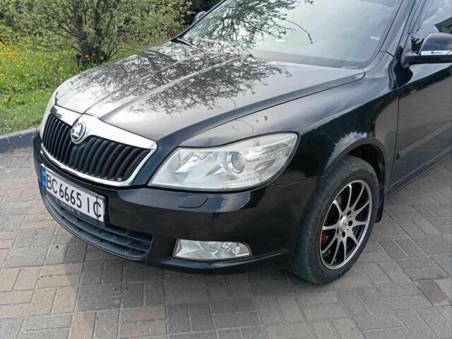 Черный Шкода Октавия, объемом двигателя 1.8 л и пробегом 210 тыс. км за 6772 $, фото 3 на Automoto.ua