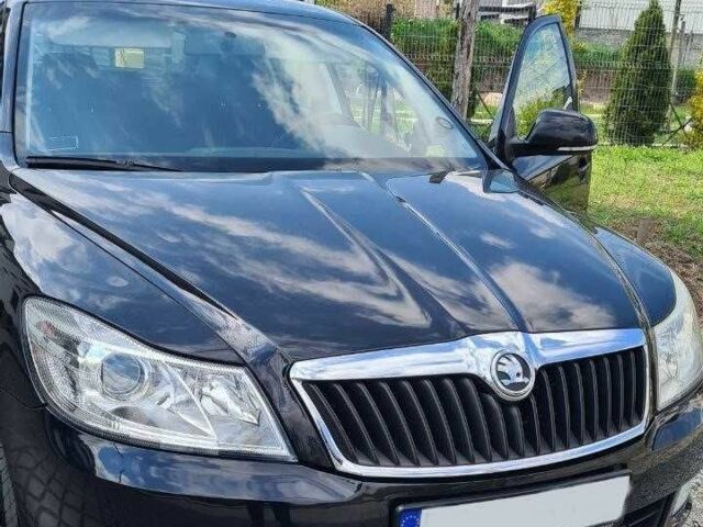 Черный Шкода Октавия, объемом двигателя 2 л и пробегом 228 тыс. км за 7000 $, фото 1 на Automoto.ua