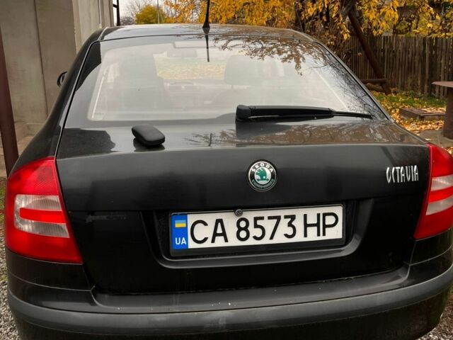 Черный Шкода Октавия, объемом двигателя 1.6 л и пробегом 204 тыс. км за 7800 $, фото 3 на Automoto.ua