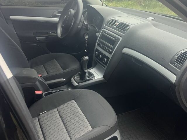 Черный Шкода Октавия, объемом двигателя 1.8 л и пробегом 180 тыс. км за 5500 $, фото 6 на Automoto.ua