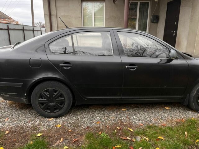 Черный Шкода Октавия, объемом двигателя 1.6 л и пробегом 204 тыс. км за 7800 $, фото 2 на Automoto.ua