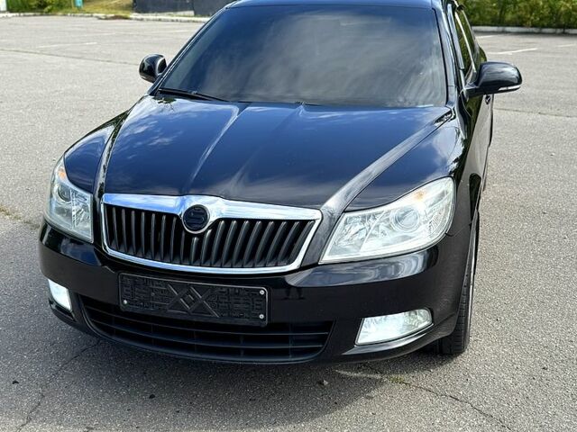 Черный Шкода Октавия, объемом двигателя 1.8 л и пробегом 202 тыс. км за 8299 $, фото 1 на Automoto.ua