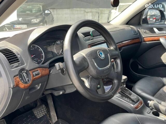 Чорний Шкода Октавія, об'ємом двигуна 1.8 л та пробігом 272 тис. км за 7990 $, фото 26 на Automoto.ua