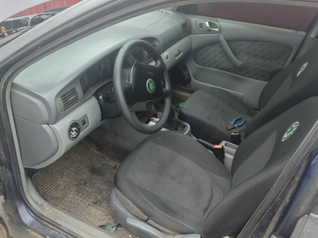 Черный Шкода Октавия, объемом двигателя 2 л и пробегом 354 тыс. км за 700 $, фото 1 на Automoto.ua