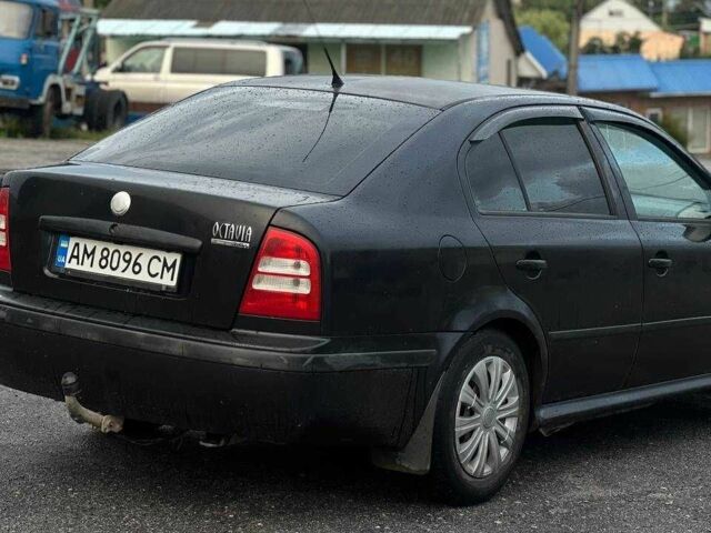 Черный Шкода Октавия, объемом двигателя 1.6 л и пробегом 255 тыс. км за 3200 $, фото 2 на Automoto.ua