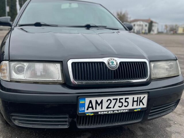 Черный Шкода Октавия, объемом двигателя 1.6 л и пробегом 204 тыс. км за 5000 $, фото 3 на Automoto.ua