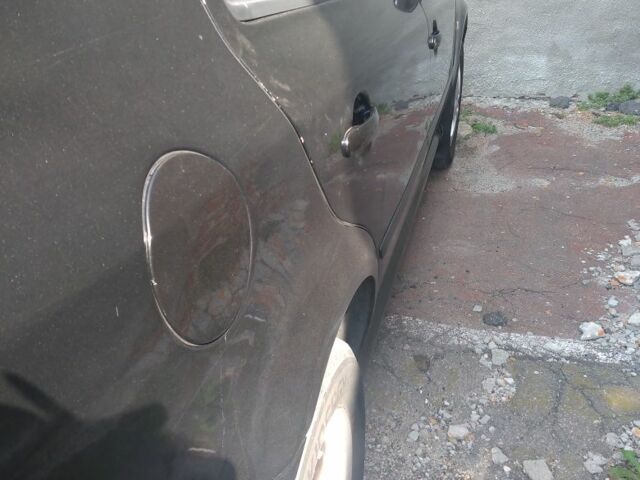 Черный Шкода Октавия, объемом двигателя 1.6 л и пробегом 320 тыс. км за 5400 $, фото 2 на Automoto.ua