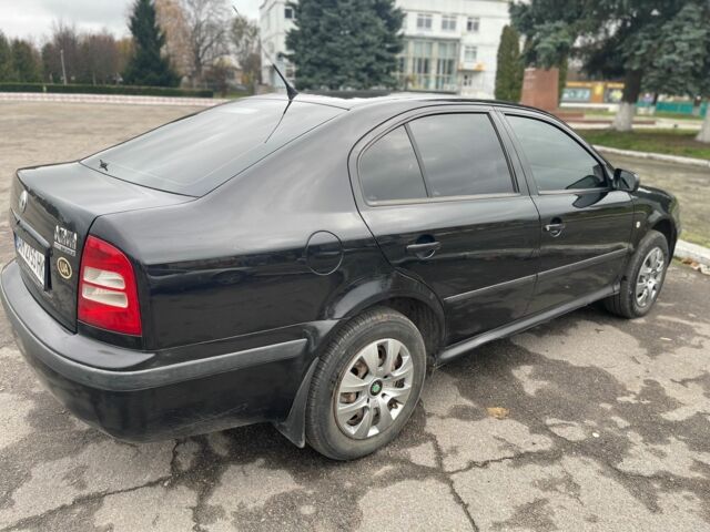 Черный Шкода Октавия, объемом двигателя 1.6 л и пробегом 204 тыс. км за 5000 $, фото 1 на Automoto.ua