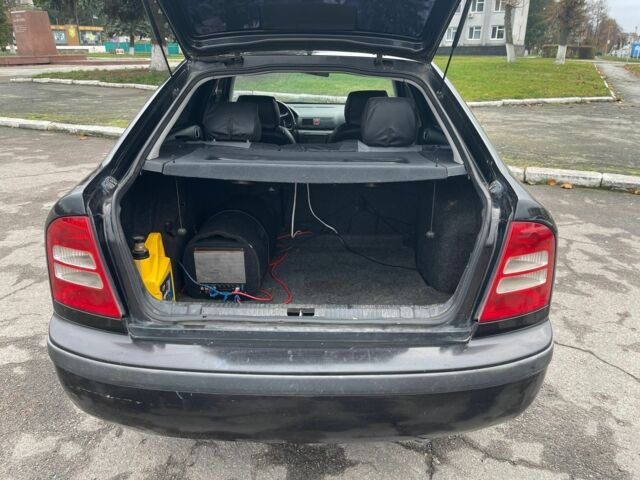 Черный Шкода Октавия, объемом двигателя 1.6 л и пробегом 204 тыс. км за 5000 $, фото 5 на Automoto.ua