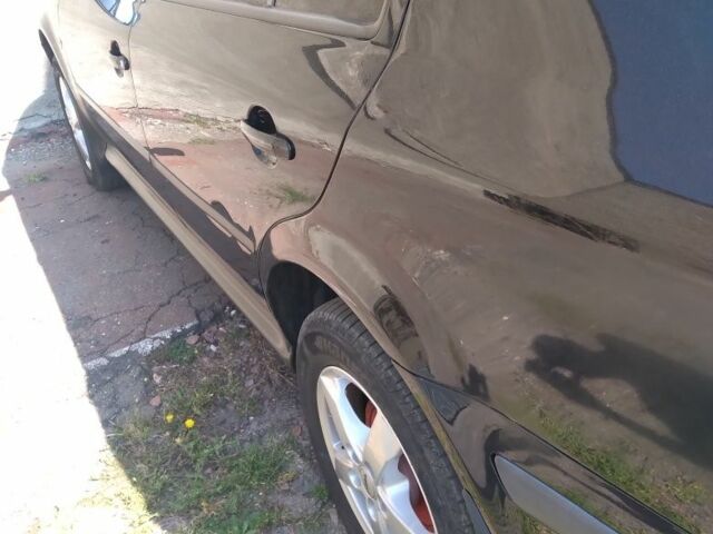 Черный Шкода Октавия, объемом двигателя 1.6 л и пробегом 320 тыс. км за 5400 $, фото 1 на Automoto.ua