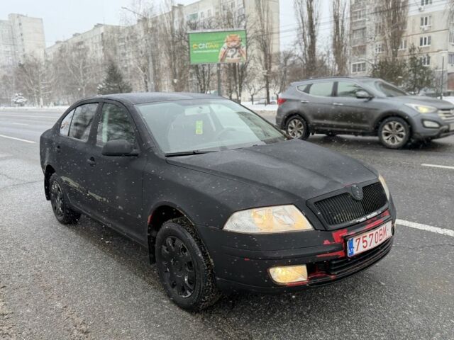 Черный Шкода Октавия, объемом двигателя 1.6 л и пробегом 258 тыс. км за 1950 $, фото 2 на Automoto.ua