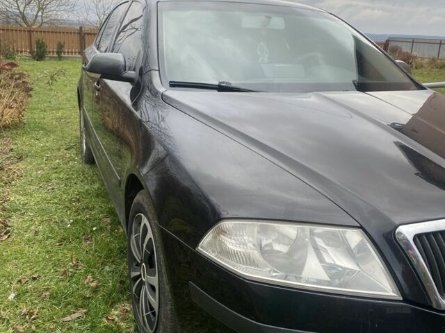 Черный Шкода Октавия, объемом двигателя 1.8 л и пробегом 360 тыс. км за 4600 $, фото 1 на Automoto.ua