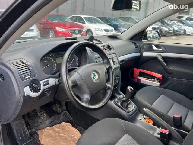 Черный Шкода Октавия, объемом двигателя 1.6 л и пробегом 132 тыс. км за 7380 $, фото 30 на Automoto.ua