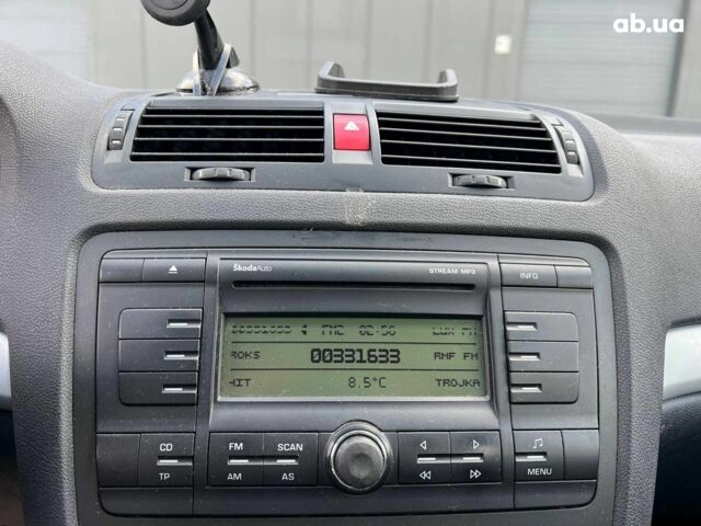 Черный Шкода Октавия, объемом двигателя 1.6 л и пробегом 132 тыс. км за 7380 $, фото 23 на Automoto.ua