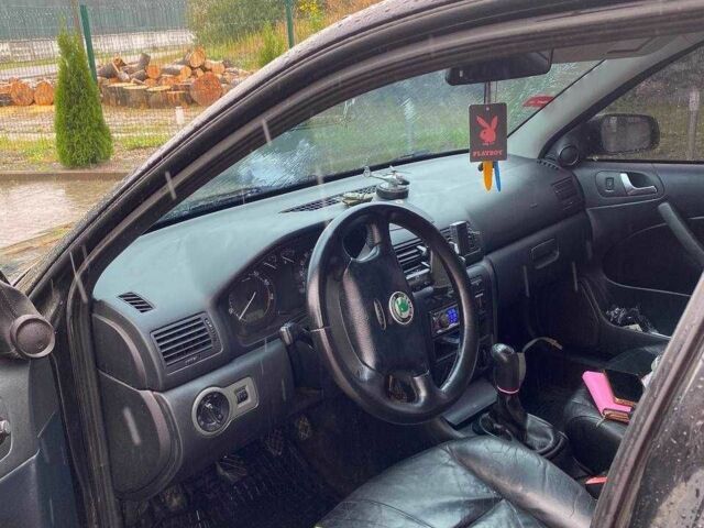 Черный Шкода Октавия, объемом двигателя 1.6 л и пробегом 200 тыс. км за 3800 $, фото 7 на Automoto.ua