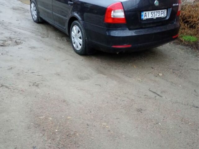 Черный Шкода Октавия, объемом двигателя 1.6 л и пробегом 315 тыс. км за 6500 $, фото 1 на Automoto.ua